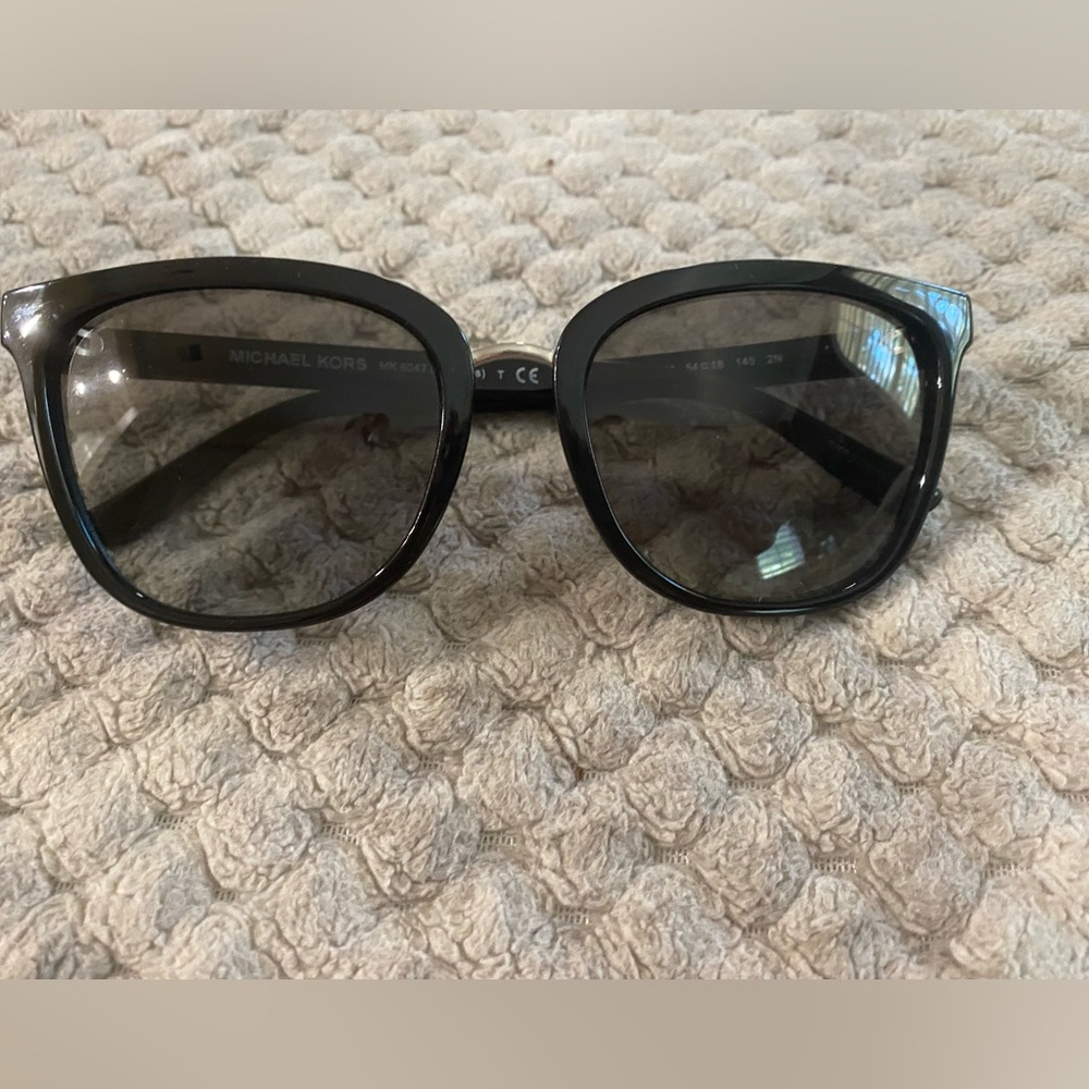 Michael Kors Mykonos black and silver sunglasses with case.
